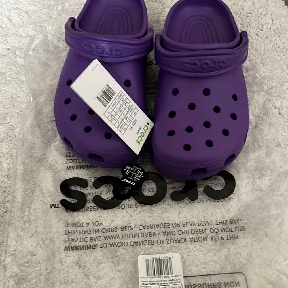 Crocs neon purple Size: Men’s:4 Women’s:6